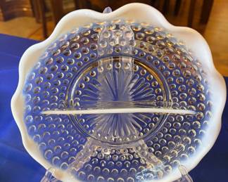 Vintage Fenton moonstone opalescent hobnail divided glass dish features a distinctive ruffled crimp edge and a two-section interior.