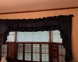Blue curtains. Tiered ruffles and valance insert.