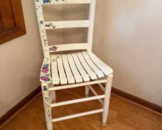 One of several painted chairs.