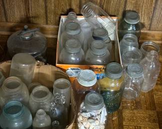 Great selection of antique jars. Ball and A