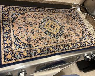 Small machine-made rug.