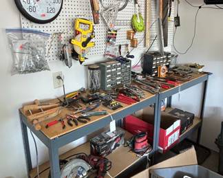 Workshop Tool Assortment with Pegboard and Workbench