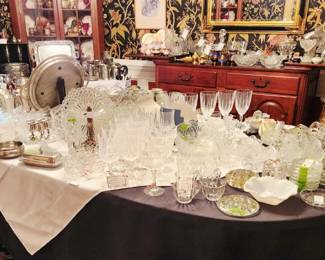 Beautiful Glassware and silver/pewter pieces throughout this room