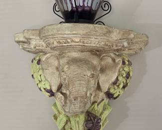 One of pair of Elephant head wall sconces