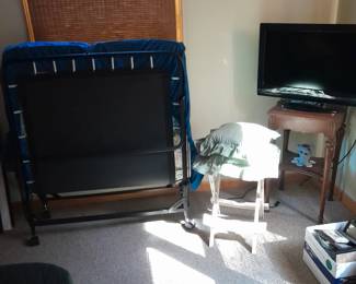 Roll away bed, television