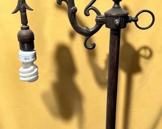 Shadeless bridge arm floor lamp