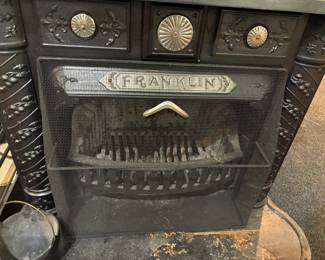 Antique Franklin cast iron stove