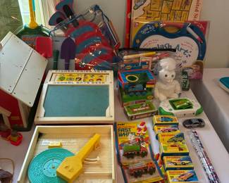 Fisher Price record player, matchbox cars, and more vintage toys