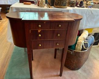 Antique mahogany Martha Washington-style sewing cabinet