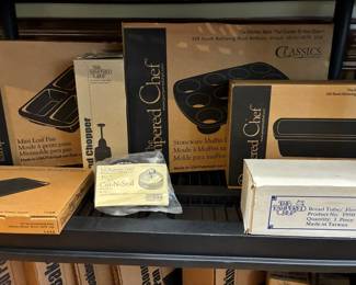 Large selection of NIB Pampered Chef stoneware and kitchen tools