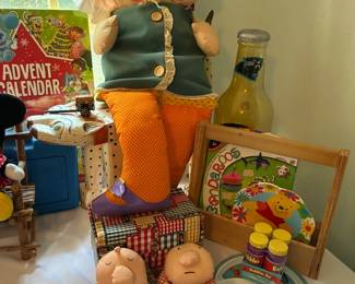 Vintage Playskool Dressy Bessy, Ziggy dolls, and Winnie the Pooh plates