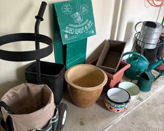 Garden tool caddy/cart, lawn leaf chute, watering cans and large planters