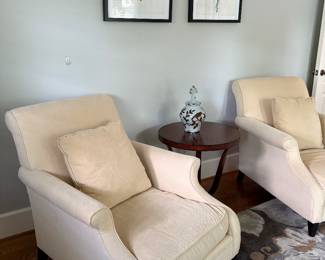 Another view of the matched set of ivory velvet armchairs and side table (2 available)