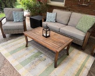 Patio furniture: couch and matched set of armchairs (2), and cocktail table