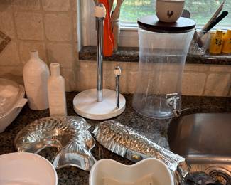 Kitchen essentials including berry bowl and paper towel holder