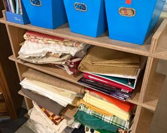 Sewing notions, bookcase and material