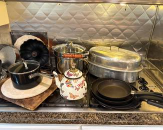 MacKenzie-Childs tea pot, roaster, skillets, stock pots, Pizza stones (2), and bundt pans