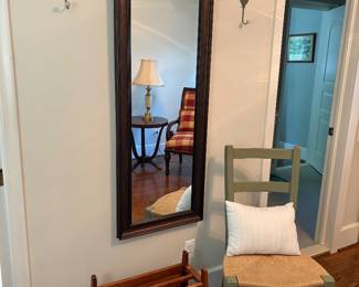 Wall mirror, magazine/book rack, and rush-seated chair