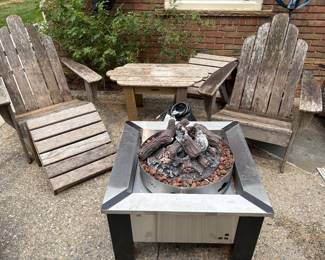 Napolean stainless steel fire pit with cover - can be direct gas line or LP tank hook up, and Adirondack chairs with ottomans and side table