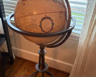 Globe in metal stand