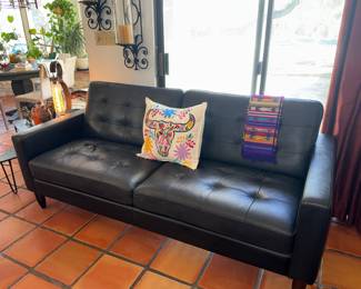 Black leather sofa