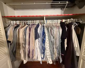 Men’s clothes in other bedroom closet (button up, polo, pants, slacks, blazers)