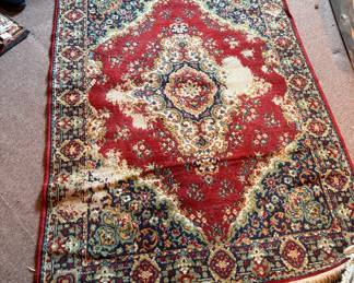 Machine made Persian rug, some wear