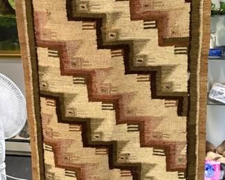 Handwoven flat-weave tribal rug