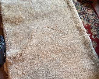 Handwoven wool pile rug