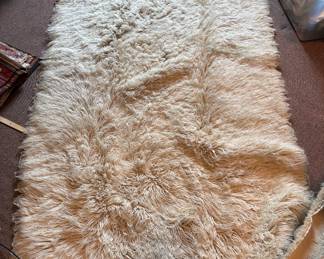 Long pile wool rug, likely Moroccan