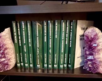 Large amethyst crystal book ends, Joel S. Goldsmith collection of mystical books.