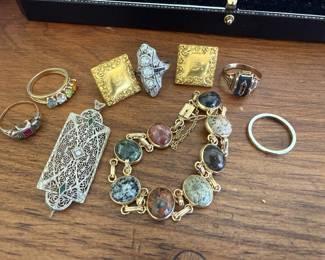 Many pieces of vintage and antique gold and silver jewelry