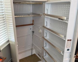 Fridge, not operational, was used to store guns and equiptment