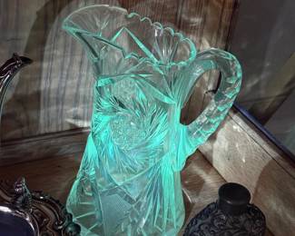 American Brilliant Period cut glass pitcher, Glows teal under UV light