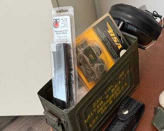 Gun care items, pepper spray and case