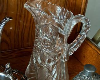American Brilliant Period cut glass pitcher, Glows teal under UV light