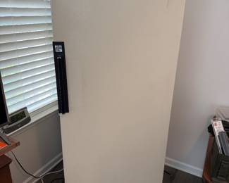 Fridge, not operational, was used to store guns and equiptment
