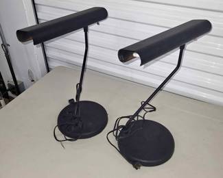 Black pair of desk lamps