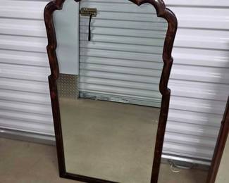 Brown scalloped mirror
