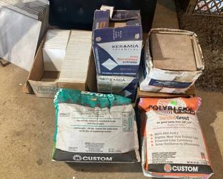 Boxes of Tile and grout