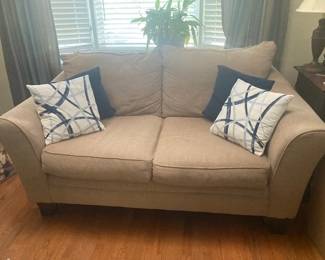 Loveseat with throw pillows