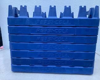 Pepsi carrying crates