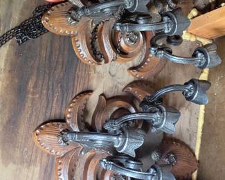 Pair of three-arm wall sconces