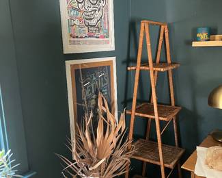 artwork and rattan shelf