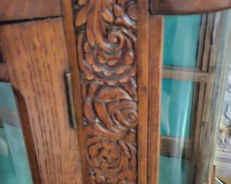 Carving on each side on cabinet