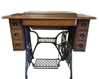 Lot #11 - Antique Singer Treadle Sewing Machine with Ornate Oak Cabinet and Cast Iron Base