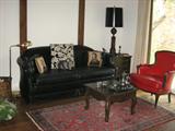 Leather sofa and red leather chair. Sofa made by Knob Creek, N.C.