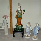 On left 13 1/2" tall Lladro #14 lady with umbrella