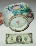 Paper label reads "Antique Chinese Porcelain over 100 years old Ching Dynasty Period." The dollar bill is for relative size comparison.