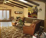 Clean tastefully decorated home, Southwest & Native American motifs throughout home, example of one of 10 spacious rooms in the Robinson home.